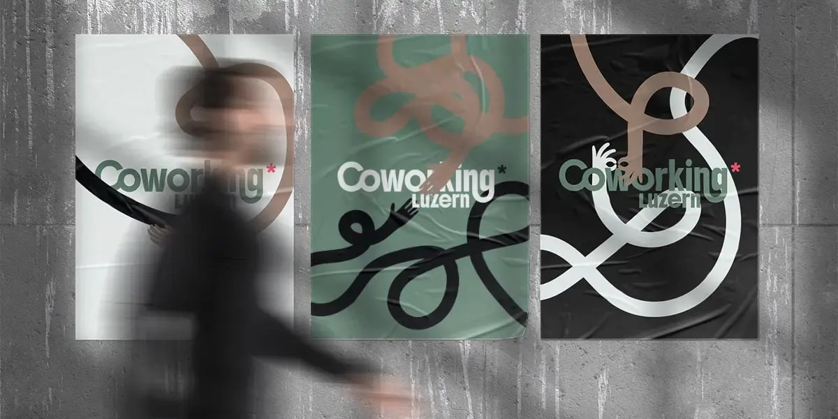 verschwommene Person läuft an 3 Coworking Luzern-Plakaten vorbei